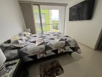 Modern, cozy, eco-field and very equipped with two bedrooms and private parking.