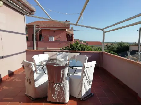 Sea view terrace and garden relaxation in green spaces Отели рядом с достопримечательностью «Nuraghe TZoddias»