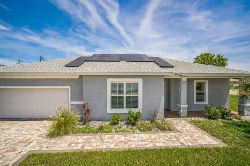 Newer Construction Home in Port Richey, High Ceilings Screened Lanai & Lake View