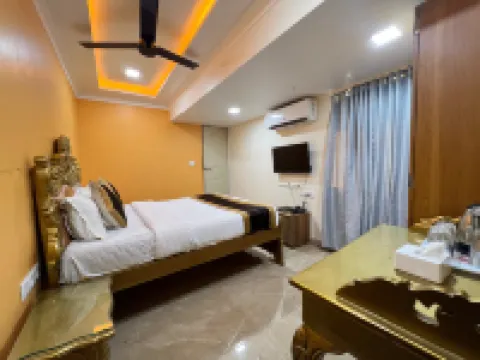 Setrac Orange Hoteles cerca de Belapur Mango Garden
