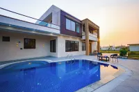 ELIVAAS Lush Haven 4BHK Villa Pvt Pool -  case vacanza in affitto