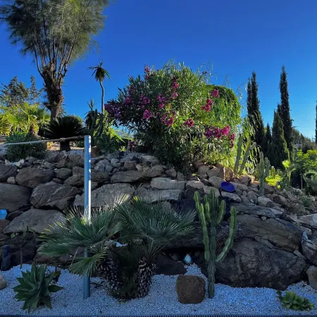 3 bed villa surrounded with tropical gardens with private pool 2 km from town.