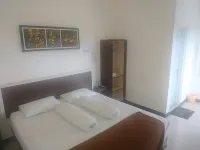 Fidelia Homestay Palu Mitra RedDoorz Hôtels à : South Palu