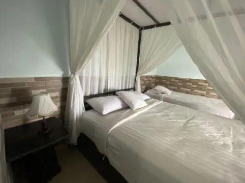 Puri Sunset Homestay Отели рядом с достопримечательностью «Водопад Мундук»