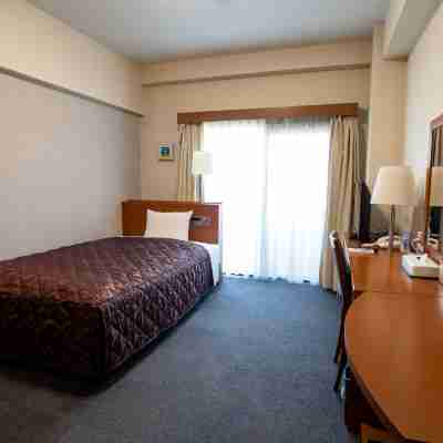 ビジネスホテル新天2010 Rooms