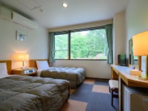 Rest Inn Taga โรงแรมใน