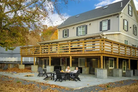 Historic Estate on a Serene Pond, Complete with Sauna, Jacuzzi, and Playground