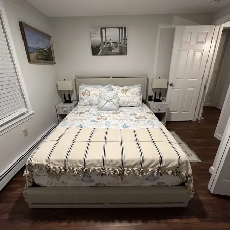 This Two-Bedroom Cottage Features One Queen Bed, Two Twin Beds, and a Sofa Bed.