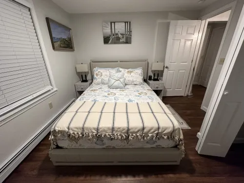 This Two-Bedroom Cottage Features One Queen Bed, Two Twin Beds, and a Sofa Bed.