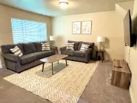 Spacious fully loaded 4-bedroom townhome sleeps 12 freeway access next to BYU Hotels in Springville