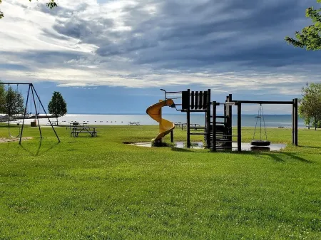 The Boathouse on Waukazoo!  Beach, Bars, Brewery all within a block!