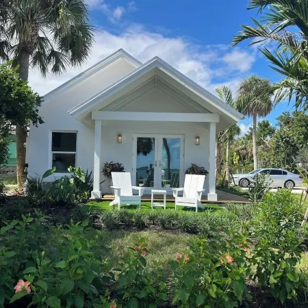 Waterfront luxury bungalow with private beach, paddleboards, kayaks and bikes!