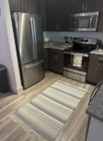 Walk to the square and the grove! This 2BR 2BA is the perfect location.