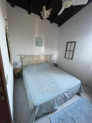Porto Istana, Villetta seen on the island of Tavolara