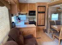 Hammocks & kayaks with1 bed trailer, tiki torches, & tent space for extra guest