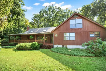 Large Home on 18 Acres of Private Woods with a Hot Tub