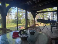 40 Acre Wooded Retreat on Columbus Lake with 1300 feet of shoreline.
