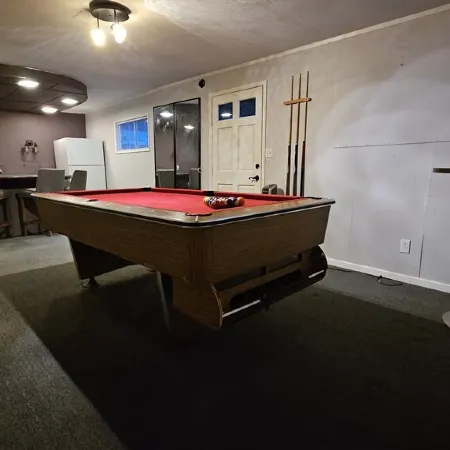 5 bed 2.5 bath w/ detached game room. Open concept, spacious for large groups.