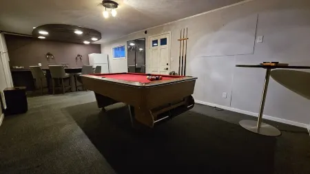 5 bed 2.5 bath w/ detached game room. Open concept, spacious for large groups.