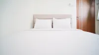 Cozy Living and Tidy 2Br at Puncak Dharmahusada Apartment - Condos