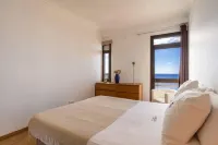 อพาร์ทเม้นท์มอนูเมนทัล 712 ระเบียงวิวทะเล โรงแรมใน