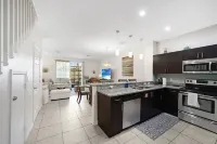 Elegant Townhouse with Heated Pool and Spa - Serene Coastal Retreat