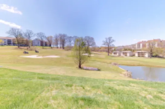 Golf-view condo with patio, central AC, pool, tennis & golf on-site