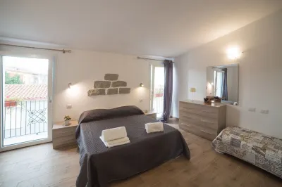 Olbia Domus Inn Hotel dekat Basilica di San Simplicio