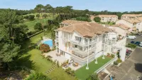 Madame Vacances les Palmiers du Golf Service Premium - Apartments