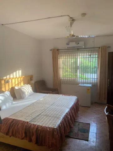 HighLander Guest House โรงแรมใน