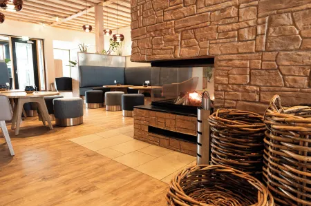 Beech Resort Plauer See Отели в г. Фюнфзеен