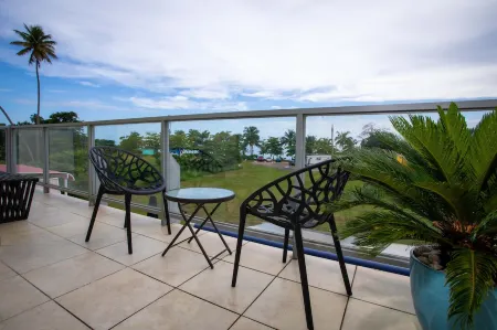 Beachfront in gated community with patio,  balcony, pool, close to all in Rincón Отели в г. Пунтас