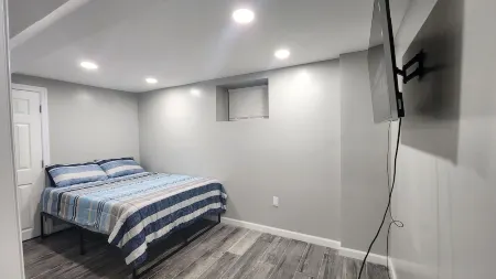 Cozy 2 Bedroom Luxury Basement Near Airport-NYC -Dream Mall -Prudential Center