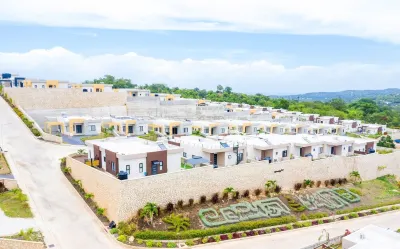 Your cool oasis home away from home. Breath taking views for relaxation Hotels near Mystic Mountain Jamaica, Rainforest Adventures