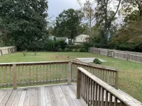 Charming house with a large fenced lot in a central location