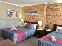 Jolly Swagman Motor Inn Euroa Hotels near Violet Town Sign painted by Michael Leunig