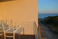 Myrtle studio apartment with sea view terrace, in the dunes 20m from free beach