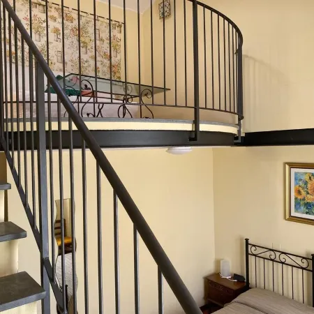 Suite Family Room with Attic and View, use of two pools at Casale del Vacanziere