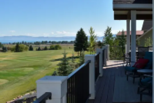 Blue Lake Retreat - fully-landscaped home sits on 2nd tee of Bear Lake G.C.