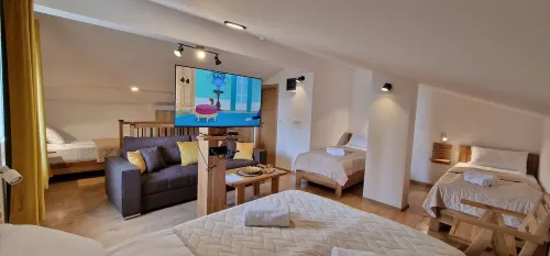 70 meters to the ski-run! Two families sized apartment on two floors! Hotels in Trnovo