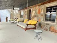The Stone Schoolhouse - Gated Lakefront Acreage with views and historic charm