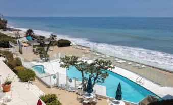 Oceanfront Gem w/ Balcony, Pool, Hot Tub & Carbon Beach Access Bluewater Haven by Avantstay