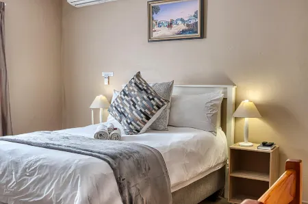 Woodpecker's Inn Guest House Отели в г. Кемптон Парк