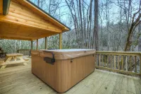 Log cabin nestled in the mountains and situated on Collett Creek