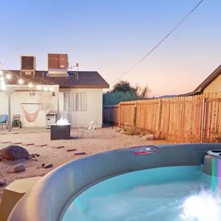 The Rockhopper - Hot Tub, Fire Pit & Walk to Downtown Jt! 4 Bedroom Home by RedAwning