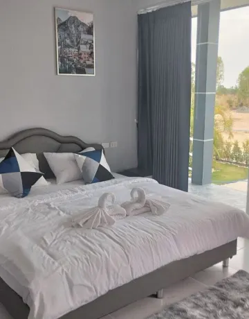 ห้องพักพร้อมระเบียงและวิวสวน(เตียงควีนไซส์)