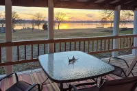 Deck & Yard: Wolf Creek Waterfront Home in Grove! - 3-Star