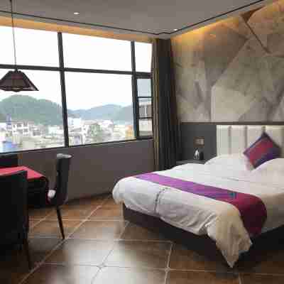 興仁鯉魚度假飯店 Rooms