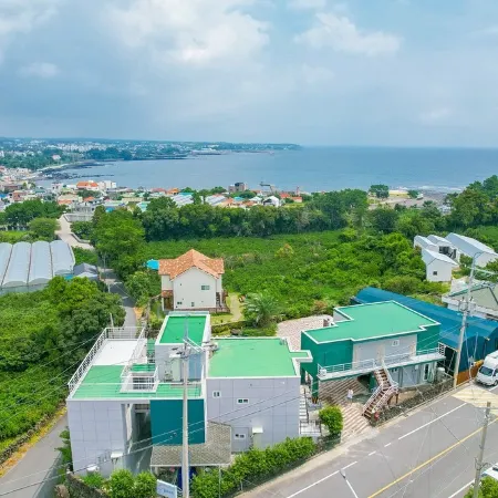 Jeju Glory Hill Pension & Guest House Отели рядом с достопримечательностью «Атлетический парк Сусан»