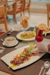 Regenta Central Lucknow by Royal Orchid Hotels Limited - petit déjeuner